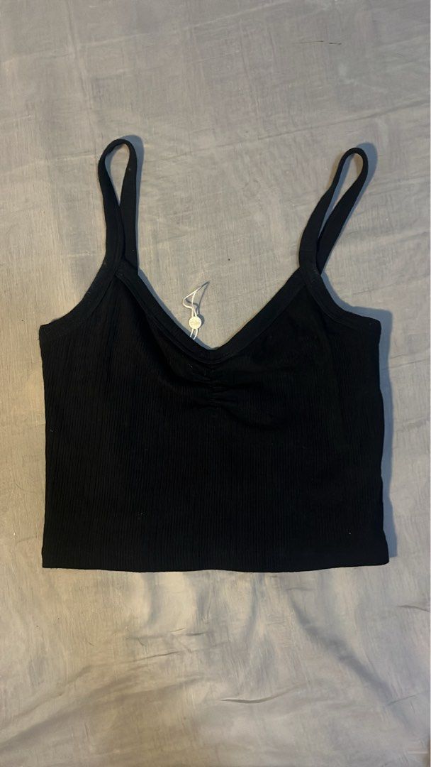 Supré Basic Front Ruched Top (Category: Sleeveless) located in Pasig City. Submitted by whoknows3000 (Listing ID 1460022936, Image 1). Description: • Size Xxs on Tag • Vv stretchable • With front ruched detail.