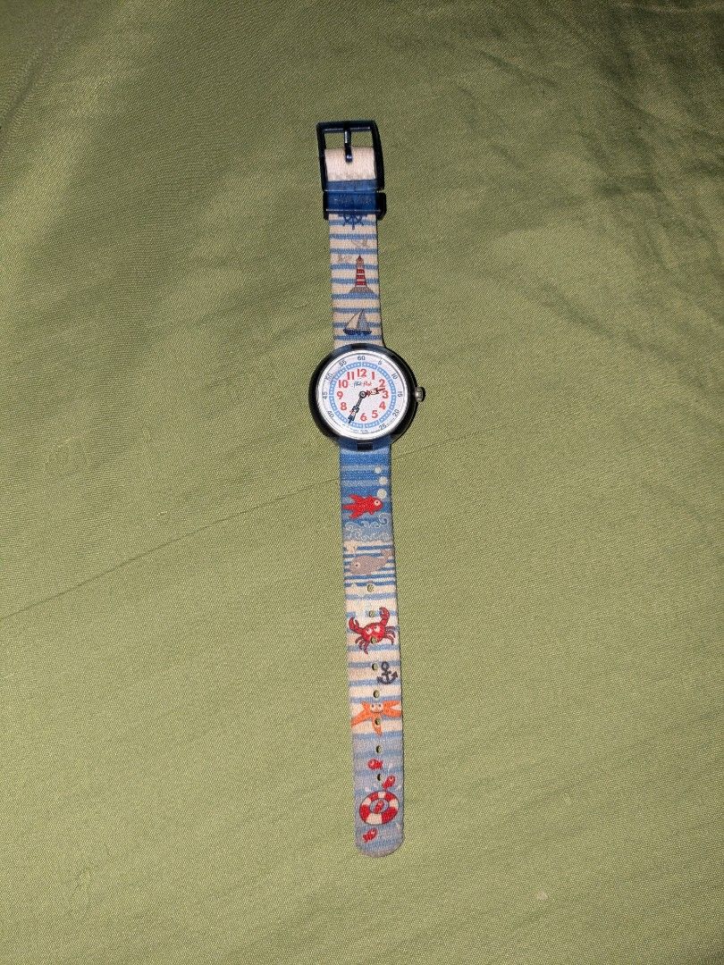 Swatch Flik flak Authentic (Category: Luxury Watches) located in Iloilo. Submitted by seoltang_0000 (Listing ID 1460058383, Image 2). Description: Preloved Swatch Flikflak Watch - for kids or can be worn by slim hand adult -authentic from SG - has small scratches on face because a child used it before.