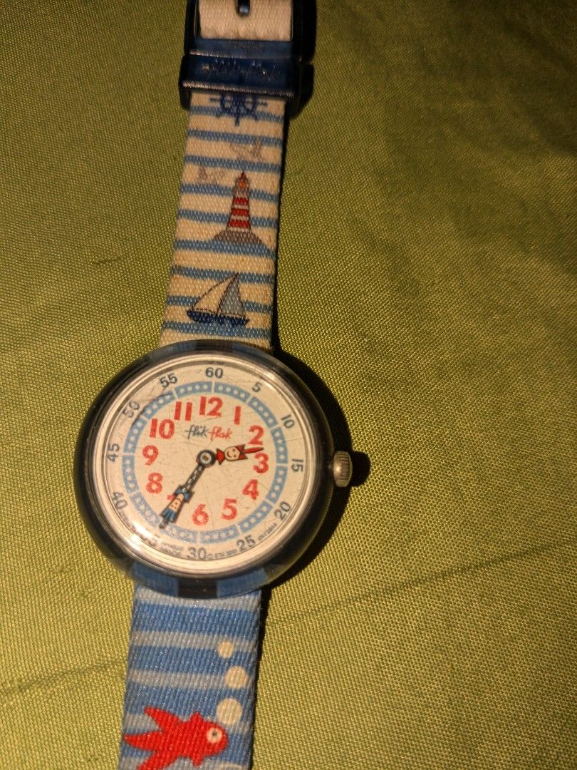 Swatch Flik flak Authentic (Category: Luxury Watches) located in Iloilo. Submitted by seoltang_0000 (Listing ID 1460058383, Image 1). Description: Preloved Swatch Flikflak Watch - for kids or can be worn by slim hand adult -authentic from SG - has small scratches on face because a child used it before.