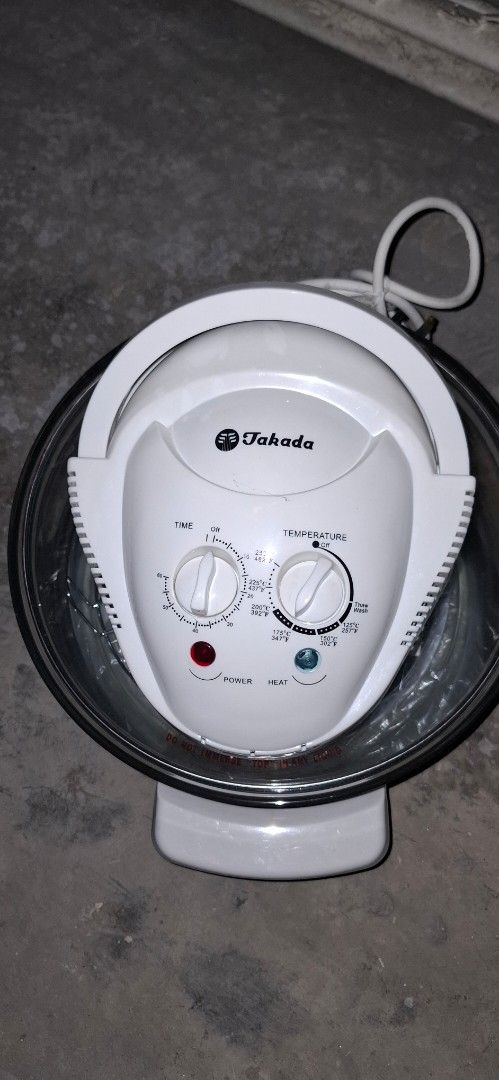 Takada Halogen Convection Oven TK-3000G (Category: Ovens & Toasters) located in Manila. Submitted by adaniel.81 (Listing ID 1460081685, Image 1). Description: - Takada Halogen Convection Oven - Model: TK-3000G - Includes: Recipe book and racks - Features: Glass bowl, adjustable temperature, and timer - Versatile: Great for baking, roasting, grilling, and more - Condition: Works well.