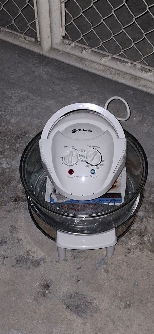 Takada Halogen Convection Oven TK-3000G (Category: Ovens & Toasters) located in Manila. Submitted by adaniel.81 (Listing ID 1460081685, Image 3). Description: - Takada Halogen Convection Oven - Model: TK-3000G - Includes: Recipe book and racks - Features: Glass bowl, adjustable temperature, and timer - Versatile: Great for baking, roasting, grilling, and more - Condition: Works well.