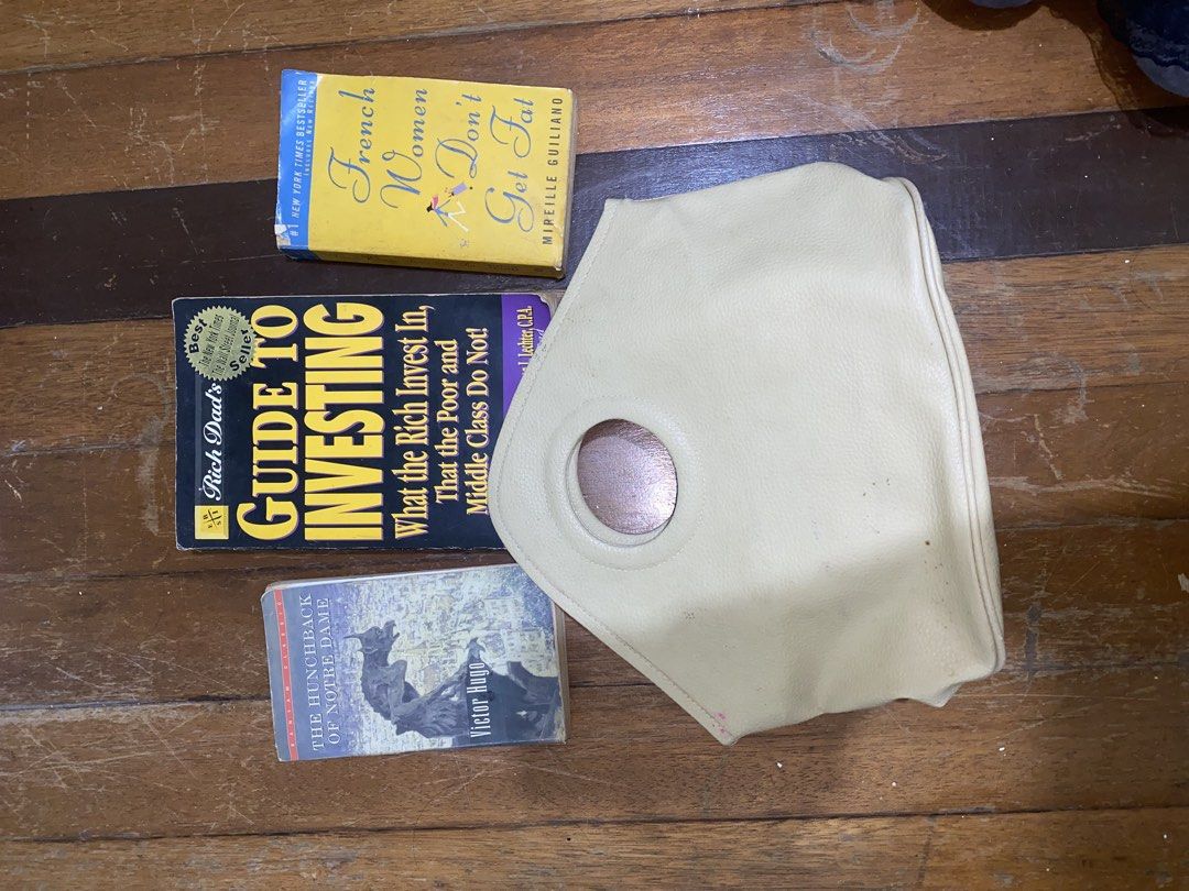Take all books for sale (Category: Storybooks) located in Manila. Submitted by nicolezald25729 (Listing ID 1460067835, Image 3). Description: - 'Guide to Investing: What the Rich Invest In, That the Poor and Middle Class Do Not!' by Robert T. Kiyosaki - 'French Women Don't Get Fat' by Mireille Guiliano - 'The Hunchback of Notre Dame' by Victor Hugo - Perfect for readers interested in finance, lifestyle, and classic literature. Take all books 📚 w