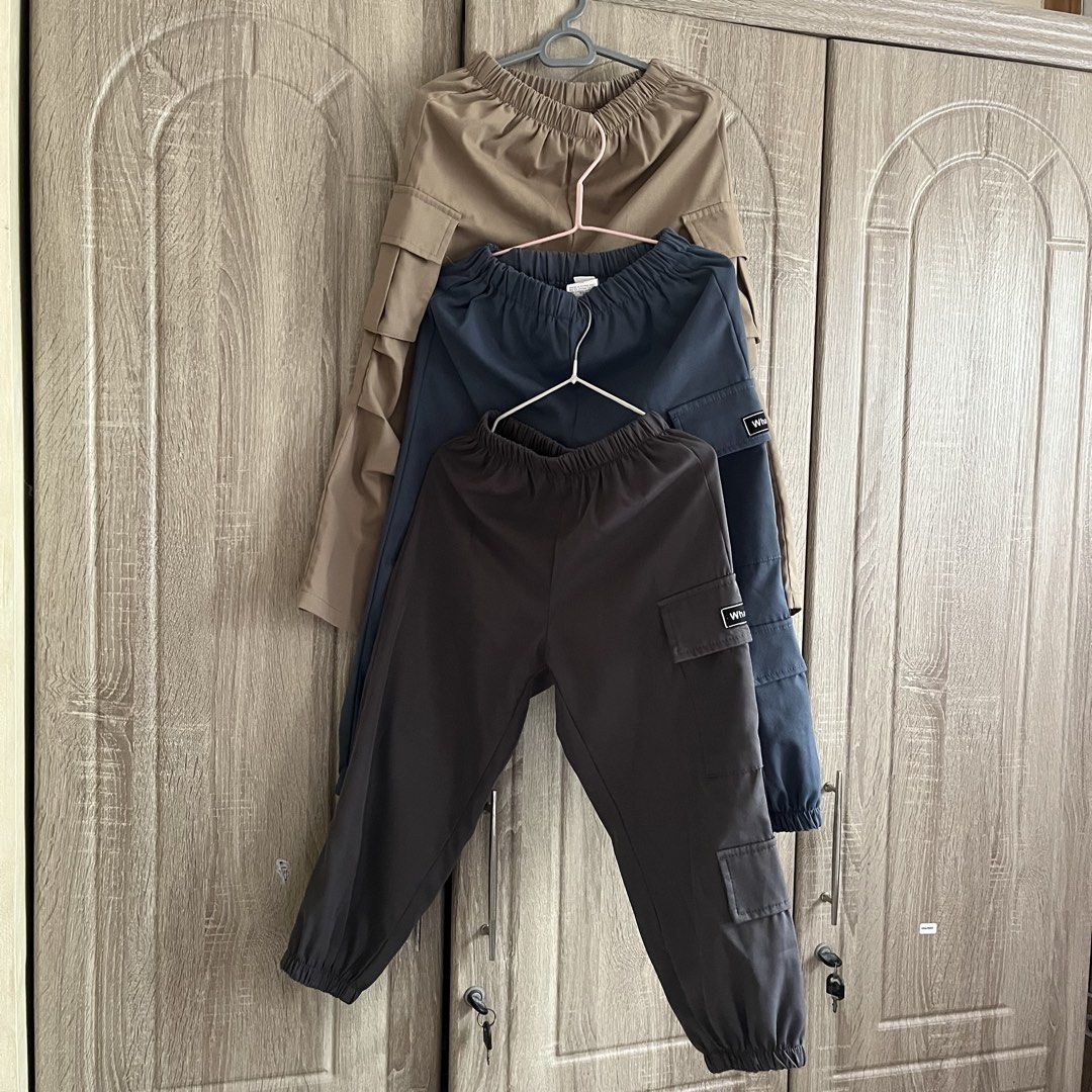 Take All SHEIN Kids Cargo Pants (Category: Babies & Kids Fashion) located in Baao. Submitted by elis.closet (Listing ID 1459934459, Image 1). Description: - Comfortable cargo pants with elastic waistband and drawstring - Multiple practical pockets - Jogger style with elastic cuffs - Ideal for casual wear and everyday activities - Available in: Khaki, Navy Blue, Dark Grey - Easy to style Preloved SHEIN Kids Cargo Pants For 4-5 yrs old PHP 150 each