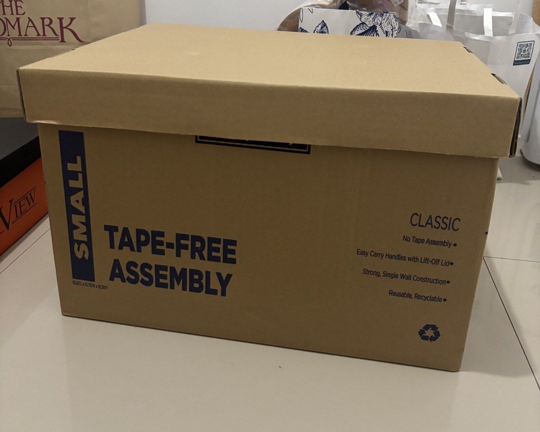 Tape-Free Assembly Moving Boxes (Category: Storage Boxes & Baskets) located in Manila. Submitted by irnsnchz (Listing ID 1460024713, Image 3). Description: - Tape-free assembly for quick packing/unpacking - Selling as a set of 2 medium and 1 small boxes - Easy carry handles and lift-off lids - Strong, single-wall construction - Reusable and recyclable - Ideal for moving house or storage PAYMENT METHODS: - BPI Bank Deposit/Transfer - Maya - GCash 