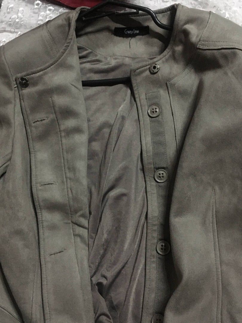 Taupe Faux Suede Button Front Jacket (Category: Coats, Jackets and Outerwear) located in Quezon City. Submitted by lizzyslittleletgos (Listing ID 1459921306, Image 1). Description: ☆ regular size ☆ embroidery design at the back ☆ comfortable.