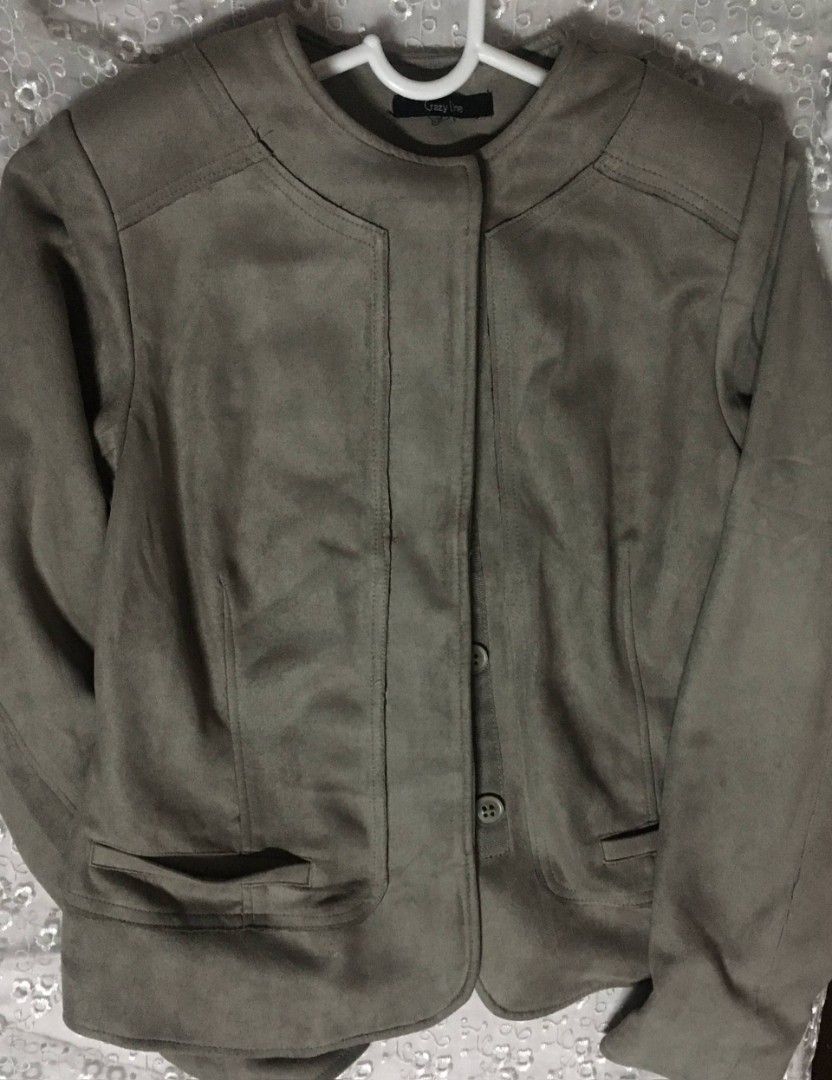 Taupe Faux Suede Button Front Jacket (Category: Coats, Jackets and Outerwear) located in Quezon City. Submitted by lizzyslittleletgos (Listing ID 1459921306, Image 3). Description: ☆ regular size ☆ embroidery design at the back ☆ comfortable.