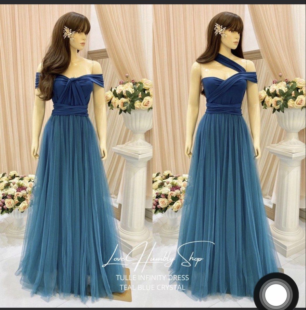Teal Blue Infinity Dress (Category: Evening dresses & gowns) located in Valenzuela. Submitted by delighted.ph (Listing ID 1460000170, Image 1). Description: - Used once; super comfortable to wear - Bought and priced at sh0p3e at 2k pesos - Can be styled in many ways since it's an infinity dress - detachable arm ribbon sleeves will be free if you purchase the dress.