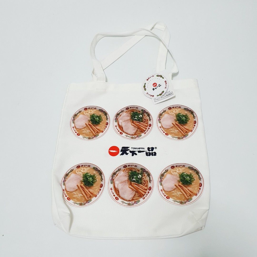 Tenkappin Ramen Tote Bag (Category: Tote Bags) located in Taytay. Submitted by kyo.mono (Listing ID 1460067386, Image 1). Description: 💟Follow us on IG: kyo.mono for faster replies TikTok: kyo.mono_ for videos and review Brand new with paper tag Auth from Japan Actual photo posted Thick material Front and back print.