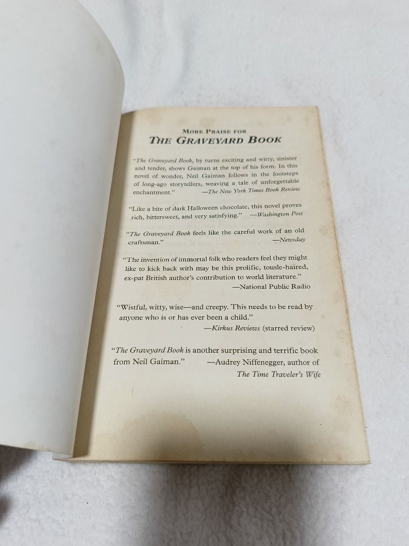 The Graveyard Book by Neil Gaiman (Category: Storybooks) located in Quezon City. Submitted by prelovedbooks2026 (Listing ID 1459978921, Image 2). Description: Price: Final - Let's save each other's time Annotations (if any: written with a PERMANENT BALLPOINT PEN, that's why it's CHEAP) NO TO LOW BALLERS (BARAT). WE'RE LISTING OUR STUFF BECAUSE WE NEED TO. - Name inscribed inside the front cover - Minor discoloration and foxing on inside pages and