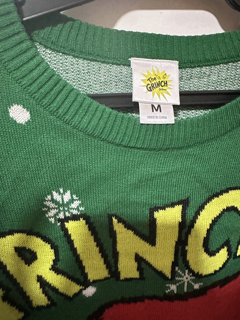 The Grinch Green Christmas Sweater (Category: Longsleeves) located in Calamba. Submitted by berngundy (Listing ID 1459974014, Image 2). Description: - Green Grinch Christmas sweater - Ideal for holiday parties or casual wear - Size: Medium (M) to Large - Worn once, bought in Australia - Material: Cozy knit .