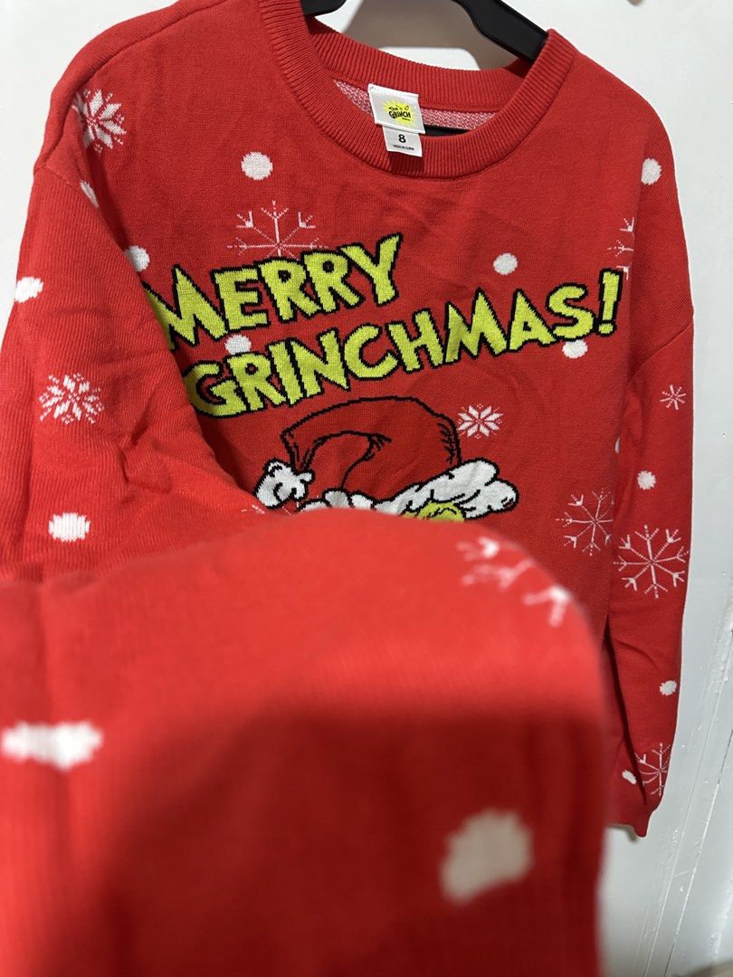 The Grinch Red Christmas Sweater (Category: Longsleeves) located in Calamba. Submitted by berngundy (Listing ID 1459973703, Image 3). Description: - Festive red Grinch sweater - "Merry Grinchmas!" text - Perfect for holiday parties or casual wear - Best fits Medium to Large - Worn once, bought in Australia.