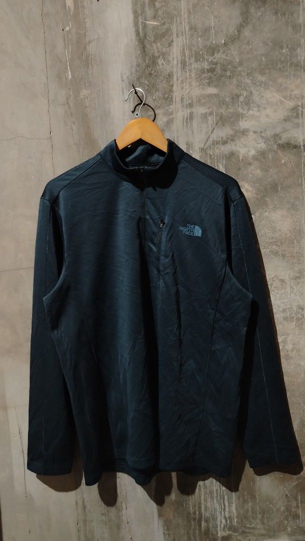 The North Face 1/4 Zip Pullover Jacket XL (Category: Coats, Jackets and Outerwear) located in Tagum. Submitted by kotasallys40096 (Listing ID 1460055444, Image 1). Description: - The North Face Quarter Zip Pullover Jacket - 23*28 - Color: Dark Blue/Black - Size: XL - Features a zippered chest pocket - Ideal for layering or wearing on its own - Suitable for outdoor activities and casual outings.