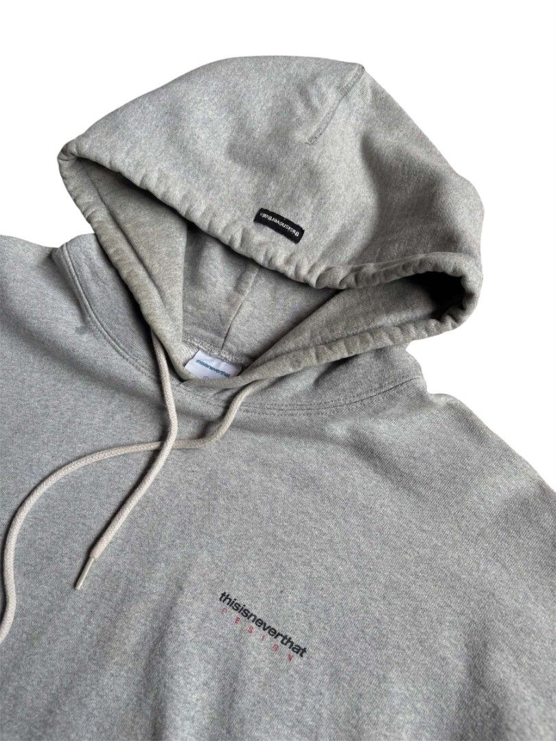 thisisneverthat Grey Cotton Hoodie Size L (Category: Hoodies) located in Manila. Submitted by deelerr (Listing ID 1460002016, Image 3). Description: -need wash (no issues) - Brand: thisisneverthat - Color: Grey - Size: L - Design: Small logo on front, large graphic on back - Material: 100% Cotton - Feature: Pre-shrunk - Ideal for: Everyday wear.