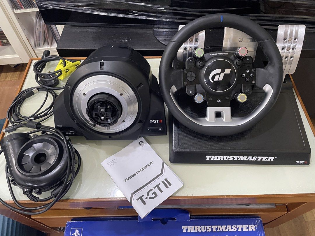 Thrustmaster TGT II （分類：遊戲週邊商品）位於 Hong Kong。 由 alai97795977 提交（商品編號 1459963878，圖片 3）。簡介： GTG II。 PC，PS5,PS4 合用 全機 90 ％ New 三踏板 100 % New 功能 100 ％ 所有配件齊全 原包裝箱 。