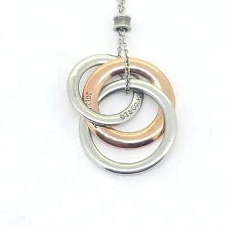 Tiffany and Co Interlocking Circle Necklace (Category: Necklaces) located in Quezon City. Submitted by theluxurycityph. (Listing ID 1459929914, Image 1). Description: Tiffany & Co Interlocking Circles Necklace Pendant Silver and Rubedo Metal.