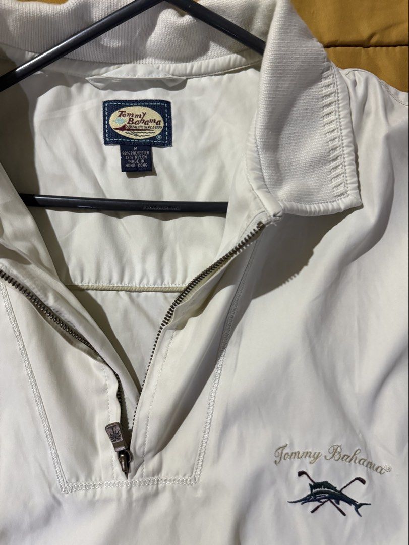 Tommy Bahama Windbreaker Pullover Jacket (Category: Coats, Jackets and Outerwear) located in Mandaluyong City. Submitted by xela.tings (Listing ID 1460021312, Image 2). Description: Light cream Oversized zip pullover with collar Embroidered logo on chest, side pockets, zippered side slit Elasticated hem and cuffs .