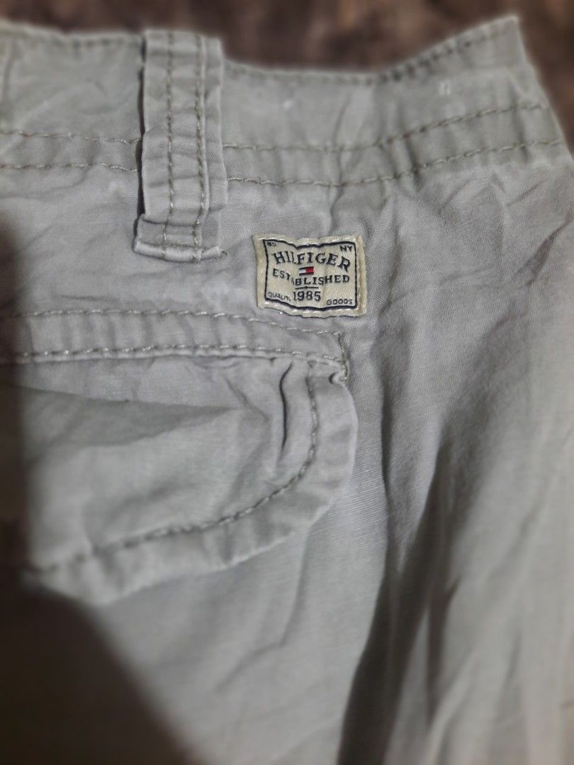 Tommy Hilfiger Cargo Shorts Grey Size 38 (Category: Shorts) located in Lapu Lapu. Submitted by markbel26 (Listing ID 1460095906, Image 2). Description: - Grey Tommy Hilfiger cargo shorts - Size 38 - Multiple pockets for ample storage - Secure button and zip closure - Ideal for casual outings.