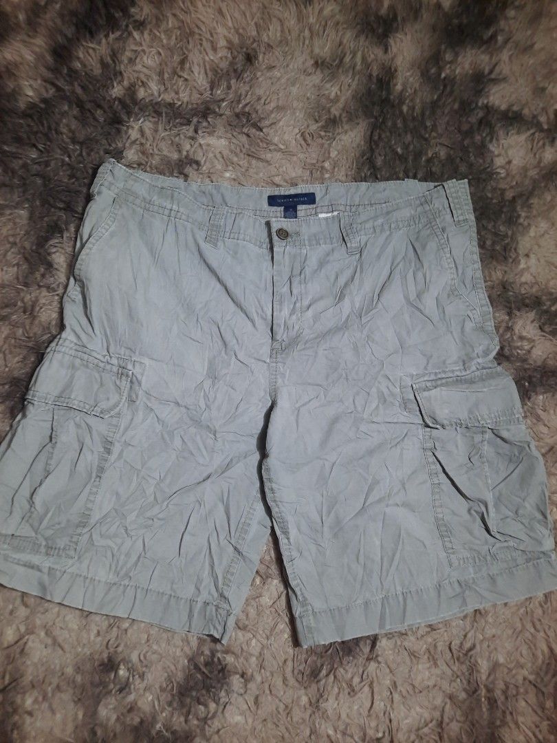 Tommy Hilfiger Cargo Shorts Grey Size 38 (Category: Shorts) located in Lapu Lapu. Submitted by markbel26 (Listing ID 1460095906, Image 1). Description: - Grey Tommy Hilfiger cargo shorts - Size 38 - Multiple pockets for ample storage - Secure button and zip closure - Ideal for casual outings.
