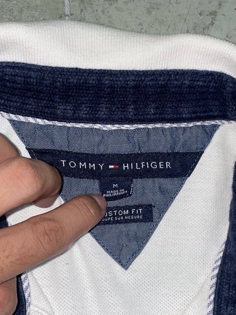 Tommy Hilfiger Polo Shirt (Category: Tshirts & Polo Shirts ) located in Las Pinas. Submitted by rdcthriftedshop (Listing ID 1460042139, Image 3). Description: 📦 Tommy Hilfiger (Authentic) Spell out embroider Medium on tag Width: 18.5 Length: 27 EXCELLENT CONDITION Color rate: 9/10 Issue: Super Light Bloody stain.