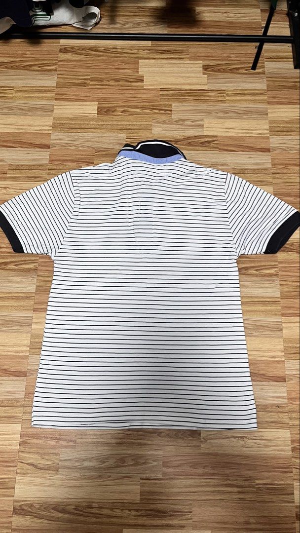 Tommy Hilfiger polo shirt (Category: Tshirts & Polo Shirts ) located in Antipolo. Submitted by kyrieyearning (Listing ID 1460075087, Image 3). Description: FS: Tommy Hilfiger polo shirt stripes Size: medium Dimes 20 by 27 issues: collar fade 100 only Location: antipolo city Mop: gcash Ship via lalamove or jnt.