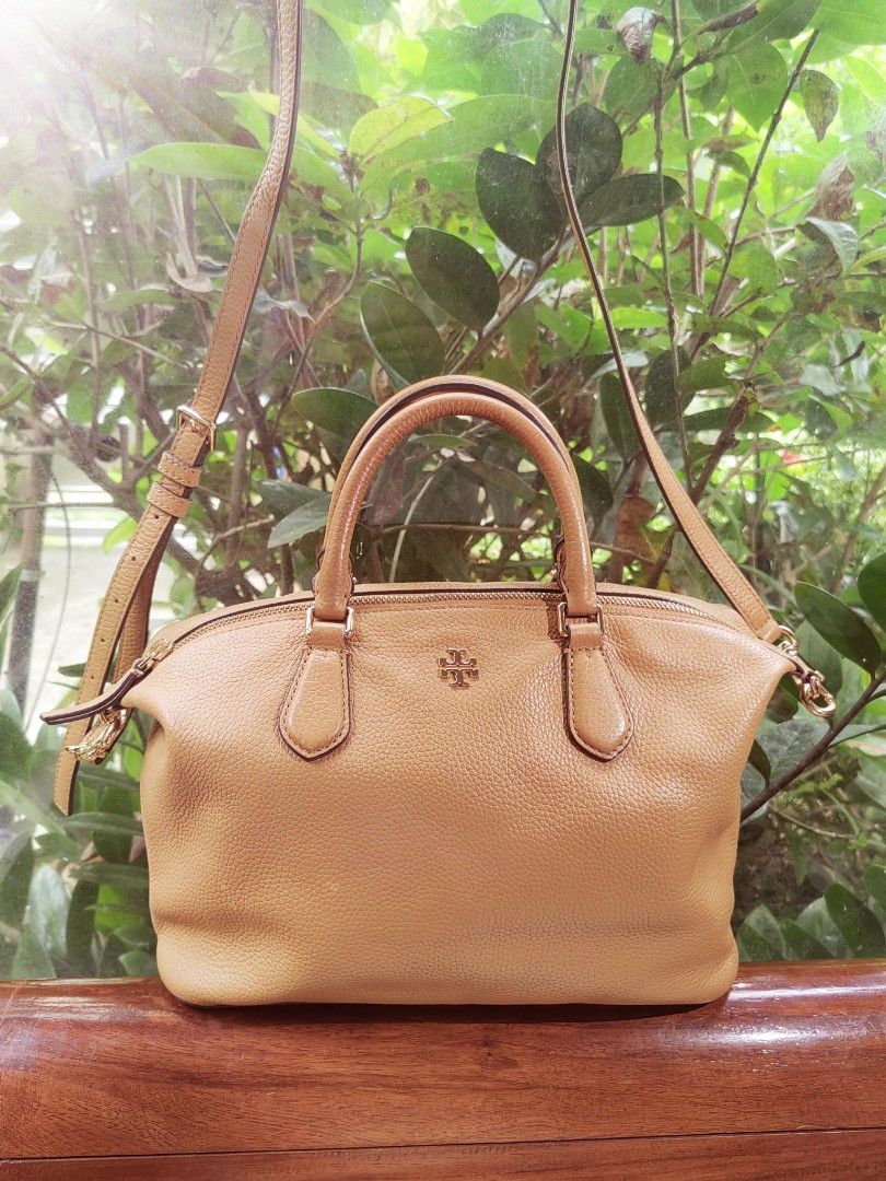 Tory Burch Carter Pebbled Leather Satchel Bag Original (Category: Luxury Bags & Wallets) located in Santa Rosa. Submitted by denisequi (Listing ID 1459936020, Image 1). Description: - Tory Burch tan leather satchel bag - Pebbled leather finish - Top handles and detachable crossbody strap - Gold hardware details - Zipper closure - Spacious interior for essentials - Ideal everyday bag.