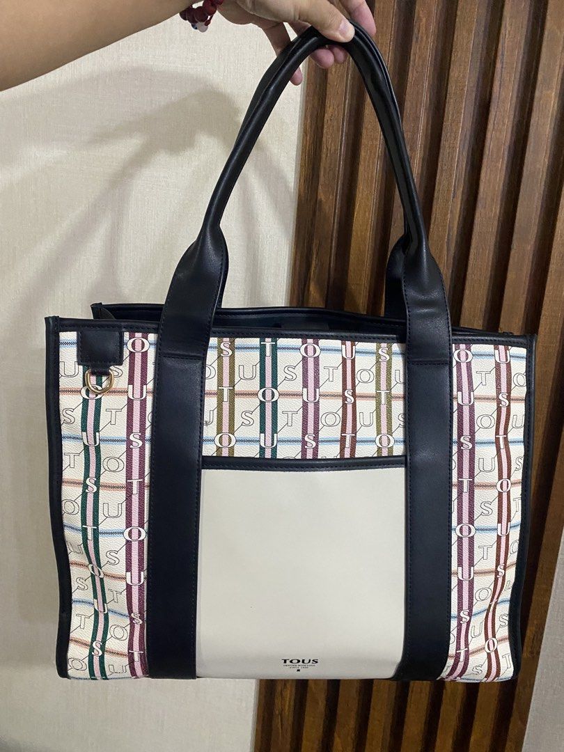 TOUS TOTE BAG (Category: Tote Bags) located in Taguig. Submitted by santos.eliza (Listing ID 1460028540, Image 2). Description: TOUS TOTE BAG ₱ 3,500 Laptop bag Travel bag Super spacious.