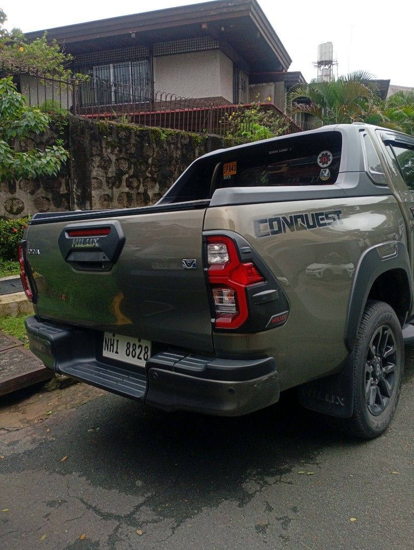 Toyota Hilux conquest V Auto (Category: Used Cars) located in Quezon City. Submitted by k4p4t1d (Listing ID 1460087382, Image 2). Description: 2023 Toyota Hilux Conquest V 4x2 (2024 acquired) 60k odo matik 1st owner Oxide Bronze color 2 Original Keys Not Flooded No Accident Complete Manual and Booklet Complete legal papers Complete Set of Tools Details: Push To Start Keyless Entry Auto Climate Control Folding Side Mirror Radar Sensor 360 Camera C