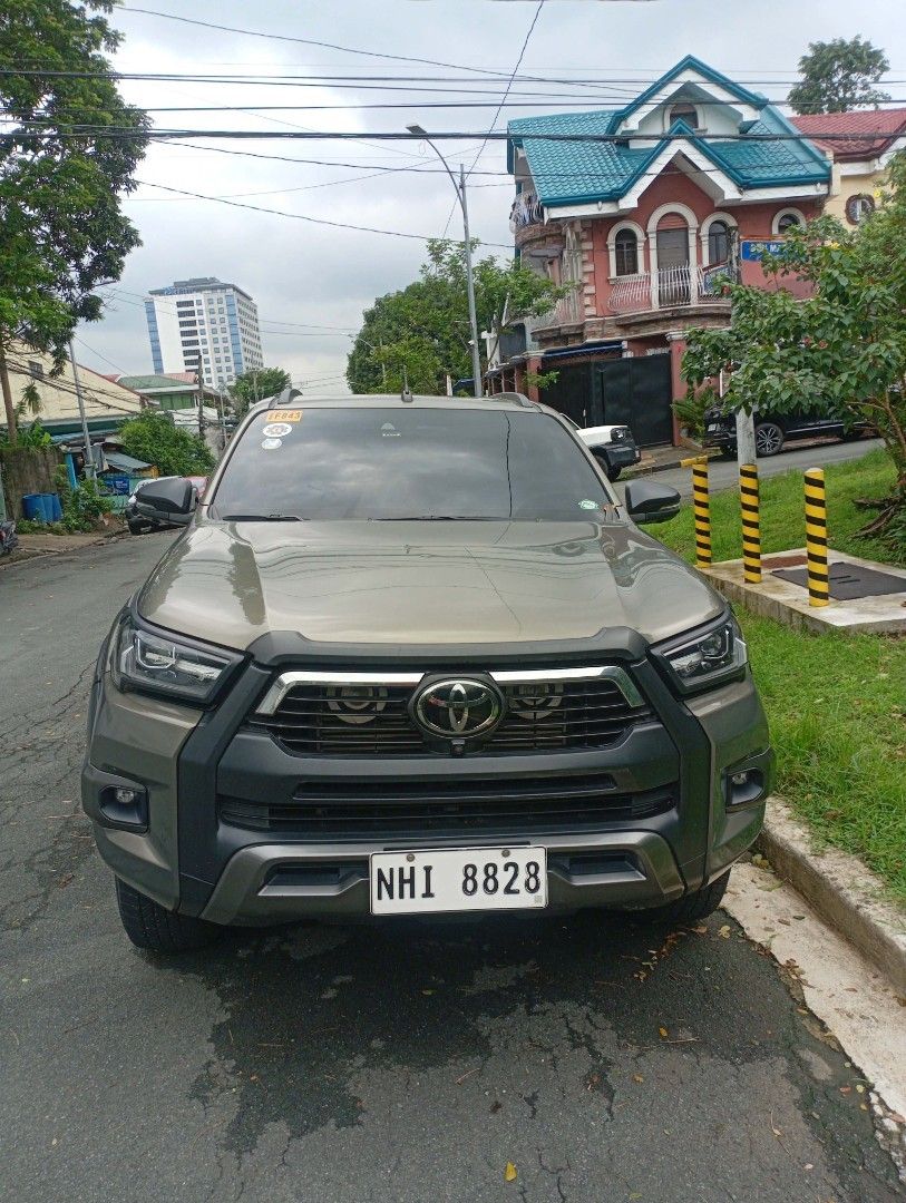 Toyota Hilux conquest V Auto (Category: Used Cars) located in Quezon City. Submitted by k4p4t1d (Listing ID 1460087382, Image 1). Description: 2023 Toyota Hilux Conquest V 4x2 (2024 acquired) 60k odo matik 1st owner Oxide Bronze color 2 Original Keys Not Flooded No Accident Complete Manual and Booklet Complete legal papers Complete Set of Tools Details: Push To Start Keyless Entry Auto Climate Control Folding Side Mirror Radar Sensor 360 Camera C