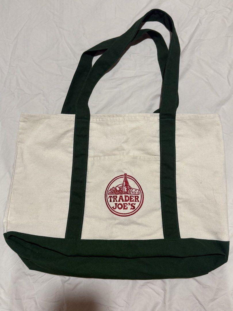 Trader Joe's Canvas Tote Bag (Category: Tote Bags) located in Muntinlupa City. Submitted by prelovedbymargs (Listing ID 1460098181, Image 1). Description: - Trader Joe’s Large Reusable Canvas Tote Bag (Dark Green) - Brand new with tag (not seen in photo) - Bought in NYC 🇺🇸, from my personal stash - RFS: Decluttering, have all the colors already - My mom just enjoys buying them there - P750 - Strictly gcash or bank transfer only - Buyer will sho