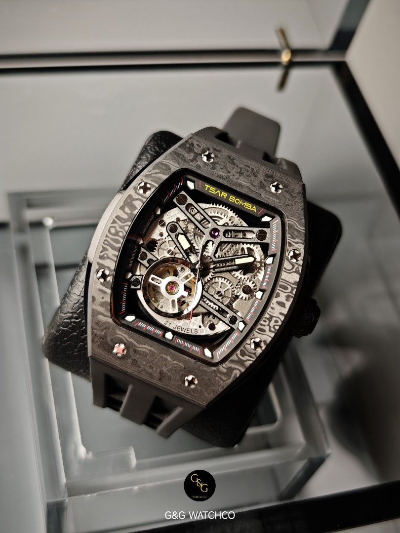 Tsar Bomba TB8228CF Black Carbon (Category: Luxury Watches) located in Bacoor. Submitted by gandgwatchco. (Listing ID 1460035012, Image 3). Description: Tsar Bomba Elemental TB8228CF 44mm snugfit slimmer Automatic Calibre 82S0 5ATM water resistant Carbon ntpt bezel 316l ssc Sapphire glass Alphaluminex lumes Wrist reference 6 inches! Perfect for 6-8 inches can be also for 5.5 Cf Brand new - Complete - Double box - Warranty Card - Manual - Watch Cl