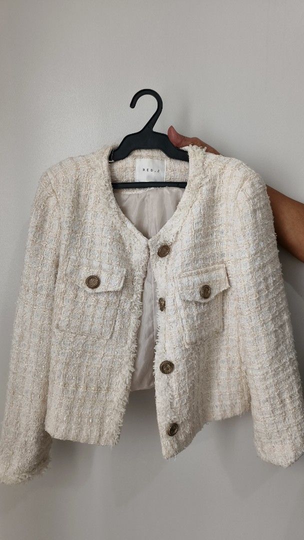 Tweed Office Jacket (Category: Coats, Jackets and Outerwear) located in Taguig. Submitted by reginejaci14726 (Listing ID 1460016974, Image 1). Description: - RED.J cream tweed cropped jacket - Features gold button details - Two front pockets - Frayed hem and collar - Fully lined - Versatile for dressing up or down.