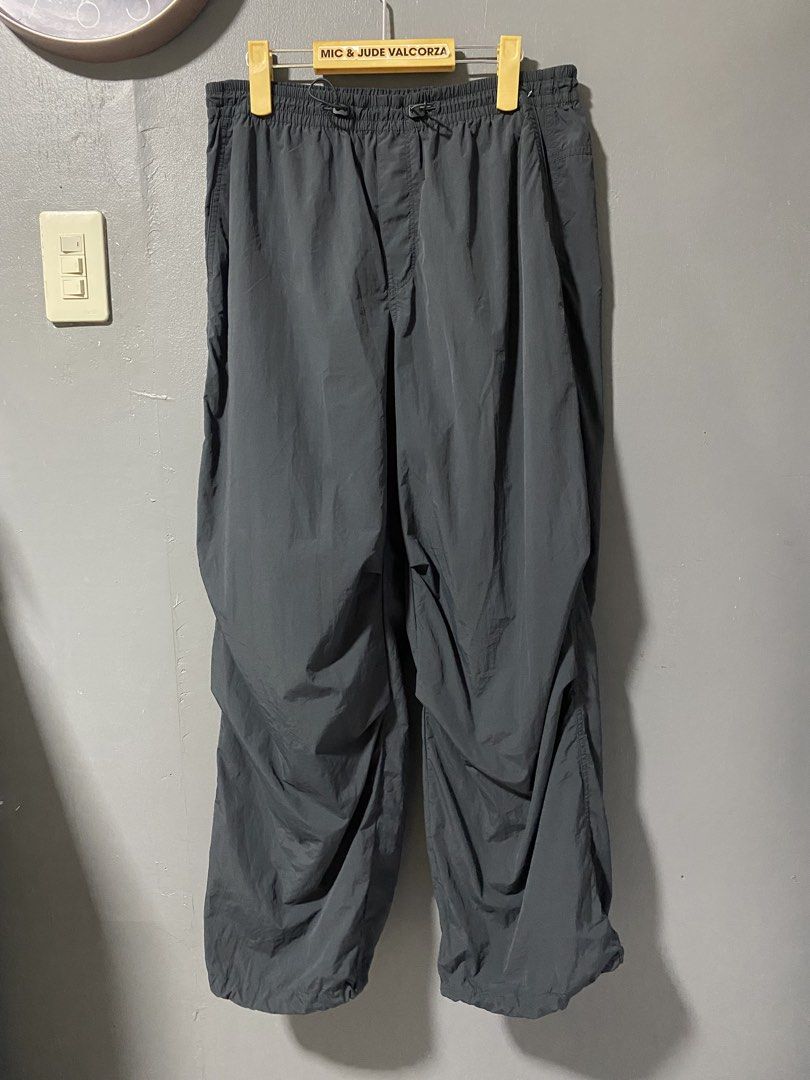 Uniqlo Parachute Cargo Pants with Drawstring Waist and Cuffs (Category: Joggers) located in Tanay. Submitted by judevalcorza (Listing ID 1459997537, Image 1). Description: - Grey cargo pants - Elastic waistband with drawstring - Two front pockets - One back pocket - Adjustable drawstring at cuffs - Comfortable fit - Ideal for casual wear or sports - Excellent Used Condition - 850 Plus Ship.