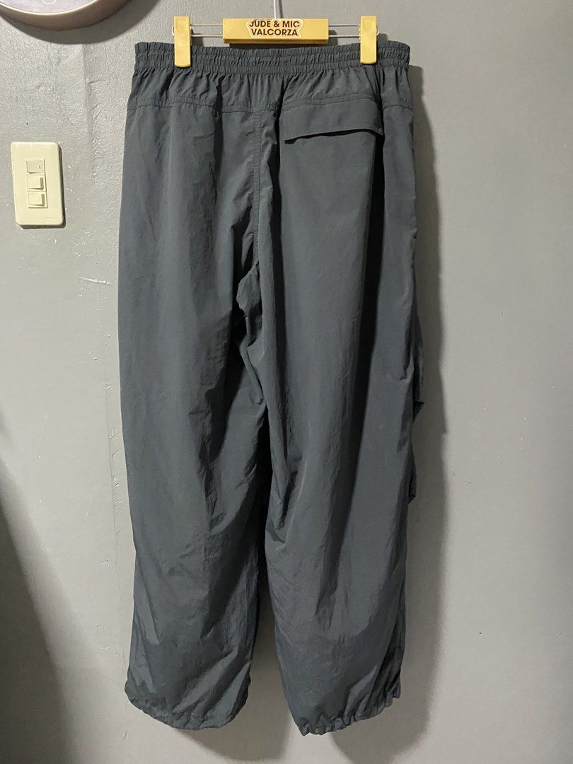 Uniqlo Parachute Cargo Pants with Drawstring Waist and Cuffs (Category: Joggers) located in Tanay. Submitted by judevalcorza (Listing ID 1459997537, Image 2). Description: - Grey cargo pants - Elastic waistband with drawstring - Two front pockets - One back pocket - Adjustable drawstring at cuffs - Comfortable fit - Ideal for casual wear or sports - Excellent Used Condition - 850 Plus Ship.