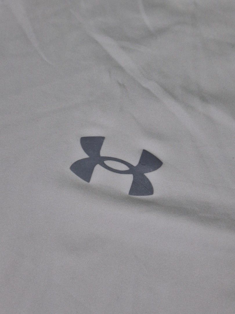 UNDER ARMOUR DRIFIT TSHIRT (freeshipping) (Category: Activewear) located in Quezon City. Submitted by gyl-stop (Listing ID 1460089256, Image 2). Description: free shipping 21 x 28.5 excellent condi cr: 9.8/10 issue: none.