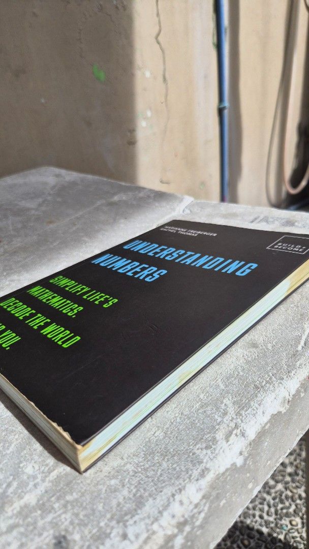 Understanding Numbers: Simplify Life's Mathematics (Category: Textbooks) located in Marikina City. Submitted by kayciigii (Listing ID 1460043974, Image 2). Description: with coffee stains and highlights but still readable.