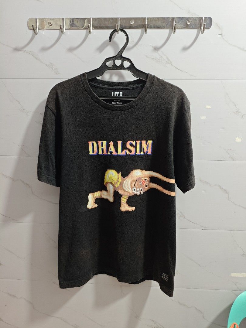 Uniqlo Dhalsim Capcom Men Tshirt (Category: Tshirts & Polo Shirts ) located in Baguio. Submitted by cool_chic (Listing ID 1460062947, Image 1). Description: Uniqlo Dhalsim Capcom Men Tshirt Color Rate 8/10 Flaw Fade Complete Tags Makapal Tela Cotton Machine Washed Size XL Dimes 22 Width 28 Length Price P129.