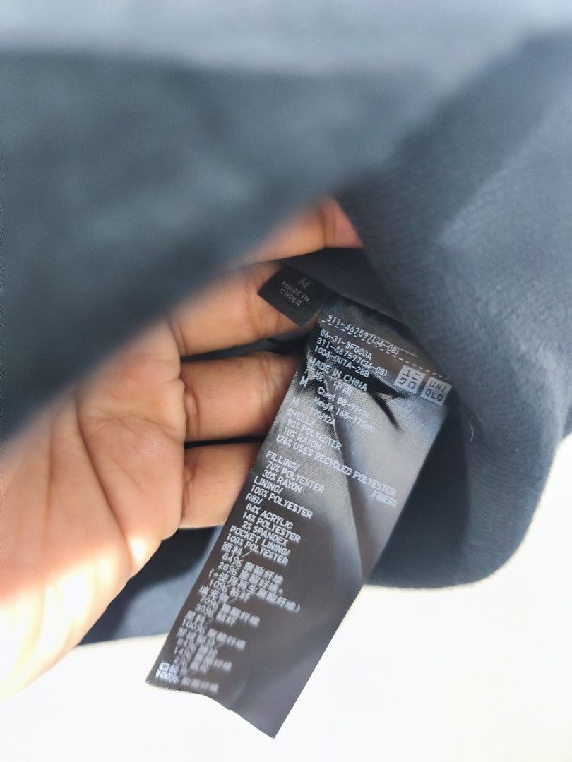 Uniqlo Engineered Garments Navy Wool Bomber Jacket (Category: Coats, Jackets and Outerwear) located in Pasay City. Submitted by tananoy0508061 (Listing ID 1460076460, Image 2). Description: - Uniqlo x Engineered Garments Navy Blue Bomber Jacket - Size: Medium (M) - Material: Wool blend outer with quilted lining - Features: Zippered sleeve pocket, buttoned front pockets - Ideal for: Cooler weather - Origin: Made in China.
