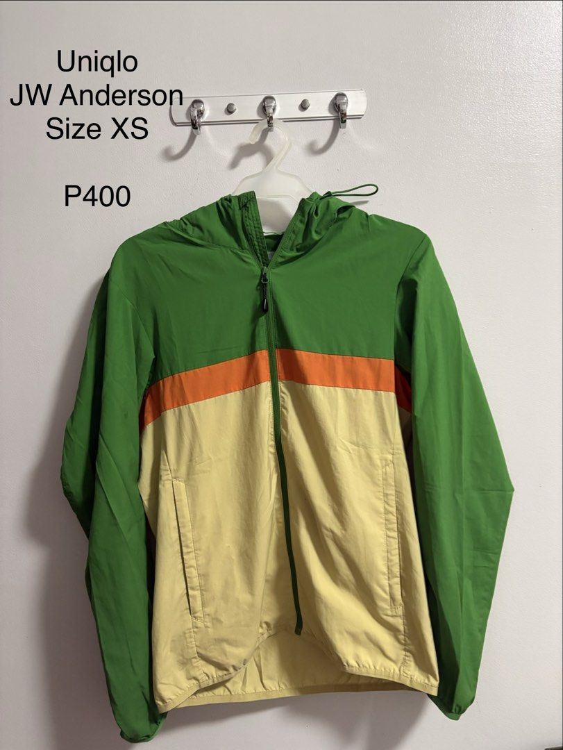 Uniqlo JW Anderson (Category: Coats, Jackets and Outerwear) located in Marikina City. Submitted by snowinsummerph (Listing ID 1460060177, Image 1). Description: - Uniqlo JW Anderson Jacket - Size: XS - Colorblock design: Green, Orange, Yellow panels - Features a hood - Full zip closure - Two side pockets - Lightweight material - Ideal for layering.