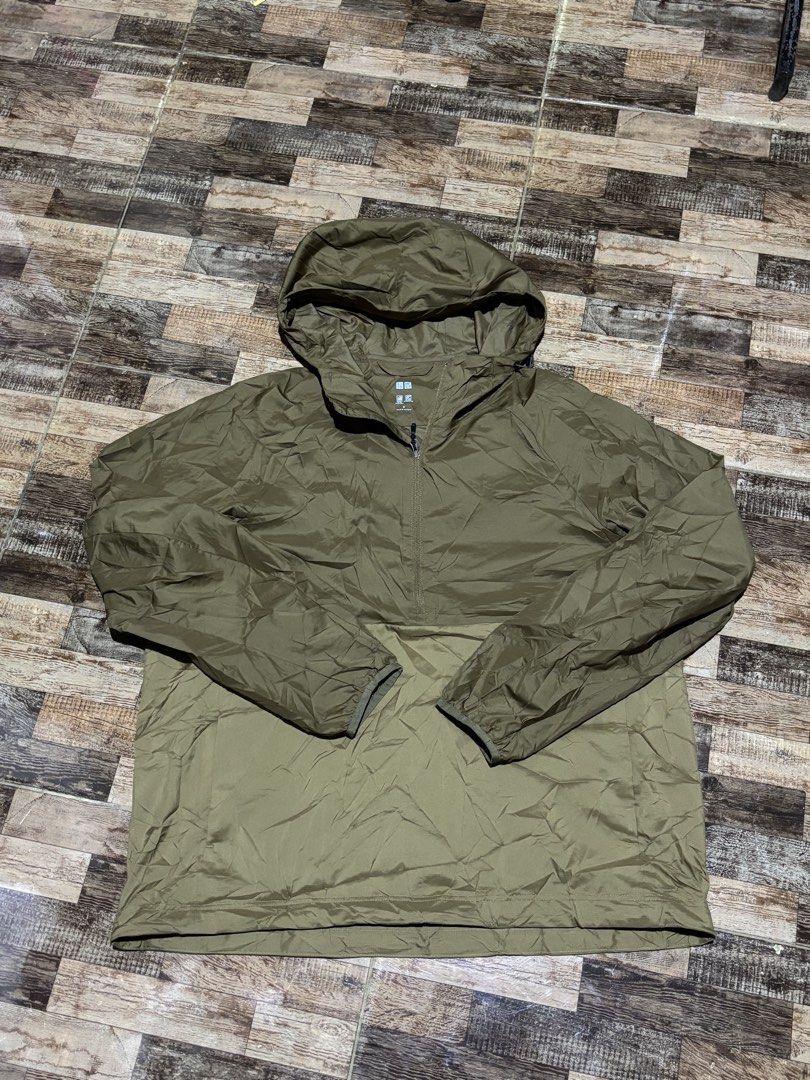 Uniqlo Windbreaker Jacket (Category: Coats, Jackets and Outerwear) located in Manila. Submitted by jaggalarrita (Listing ID 1460025669, Image 1). Description: - Uniqlo Windbreaker Jacket - Color: Olive Green - Lightweight and Packable - Features a Hood - Half-Zip Closure - Made in Vietnam - Ideal for Outdoor Activities or Casual Wear.