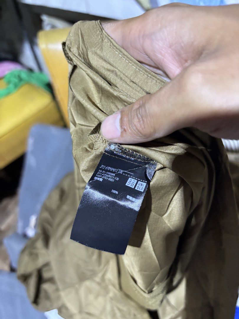 Uniqlo Windbreaker Jacket (Category: Coats, Jackets and Outerwear) located in Manila. Submitted by jaggalarrita (Listing ID 1460025669, Image 3). Description: - Uniqlo Windbreaker Jacket - Color: Olive Green - Lightweight and Packable - Features a Hood - Half-Zip Closure - Made in Vietnam - Ideal for Outdoor Activities or Casual Wear.
