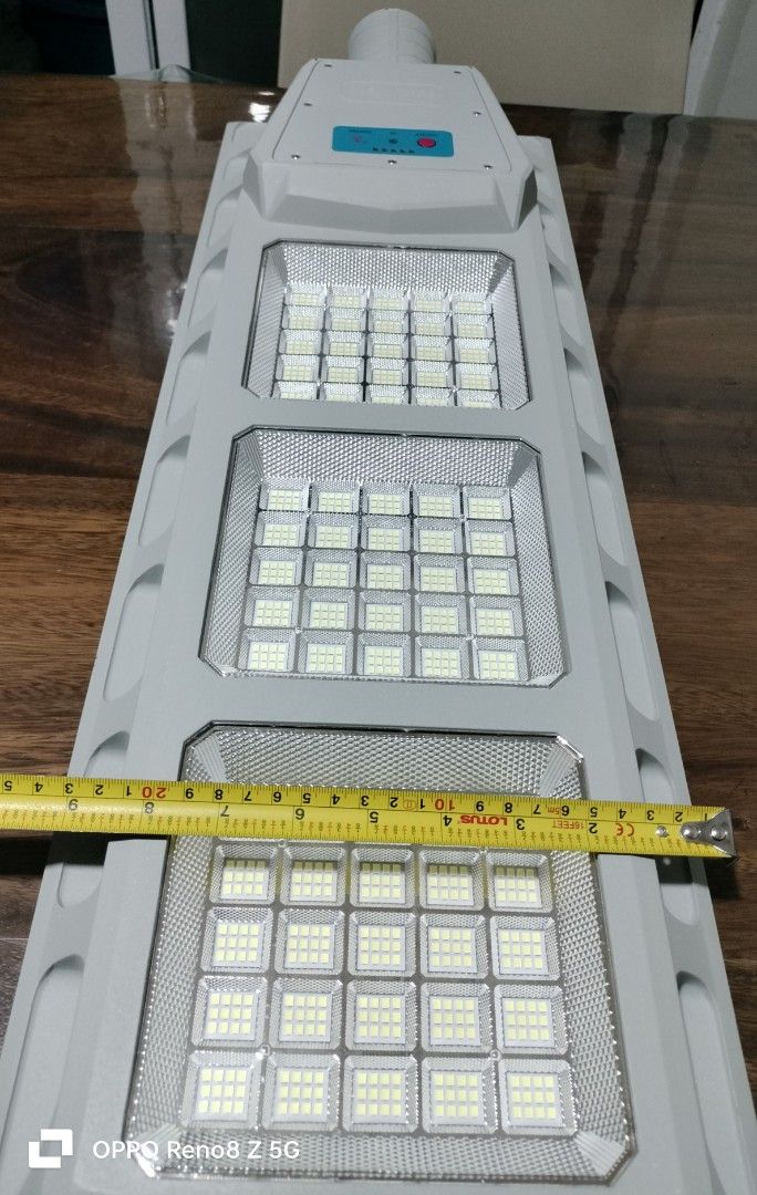 UPIN 300W Solar Street Light with Remote Control (Category: Lighting) located in Manila. Submitted by ablsolar (Listing ID 1460034143, Image 3). Description: - Bright 300W Solar Street Light - High quality solar light - lamp size (81cmx24cm x7cm) -Battery; 2600mah/ Lithium iron phosphate -Solar panel; Mono cristaline -Materials ; Aluminum + optical reflector -Charging time about 6 hours - Lighting time ; 3 rainy days - Comes with remote control p
