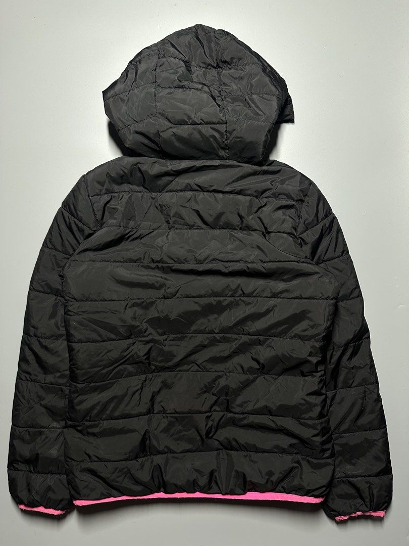 V4 - 4 Nike youth puffer jacket (Category: Hoodies) located in Bauang. Submitted by laceituplu (Listing ID 1460082687, Image 2). Description: Nike youth puffer jacket featuring a bright pink hood lining, zipper, and matching pink Swoosh logo on the chest..