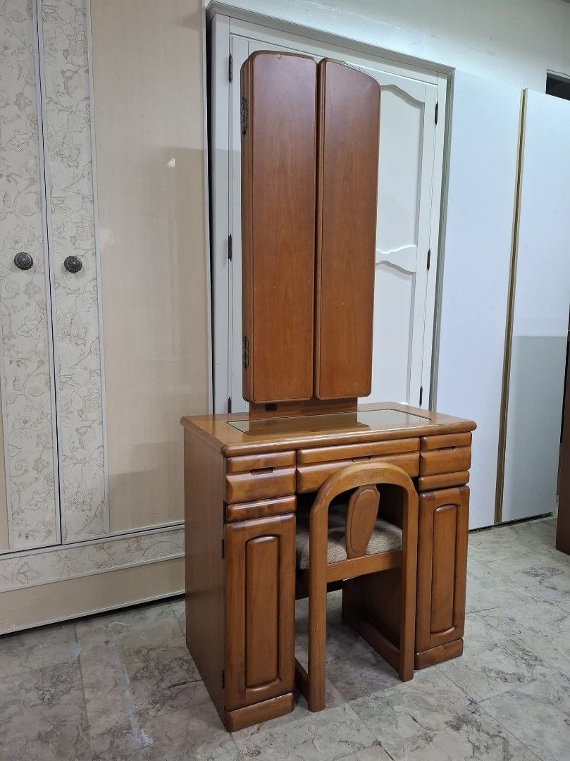 Vanity Table with Trifold Mirror and Chair Set (Category: Tables & Sets) located in Quezon City. Submitted by dannikkishoppe2 (Listing ID 1460099653, Image 3). Description: Vanity Table with Trifold Mirror and Chair Set‼️₱12000‼️ *solid wood Please manage your expectations as there might be minimal flaws. Color may vary due to lighting, it may appear darker or lighter in person. Check photos first before buying. Please refrain from purchasing if 
