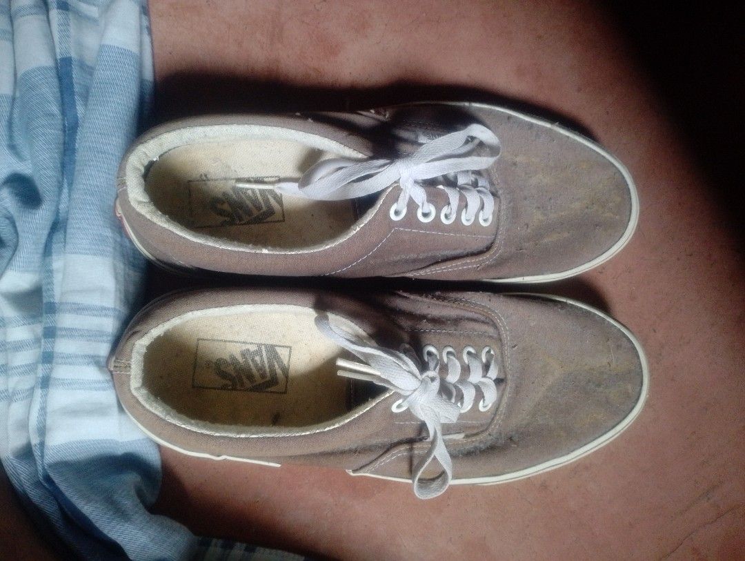 Vans Authentic Brown Checkerboard Heel Sneakers size 9 (Category: Sneakers) located in Manila. Submitted by paul281 (Listing ID 1459988417, Image 2). Description: - Classic Vans Authentic sneakers - Brown canvas material - Iconic checkerboard detail on heel tab - White laces - Soles show some wear but have plenty of grip - Great for everyday wear.