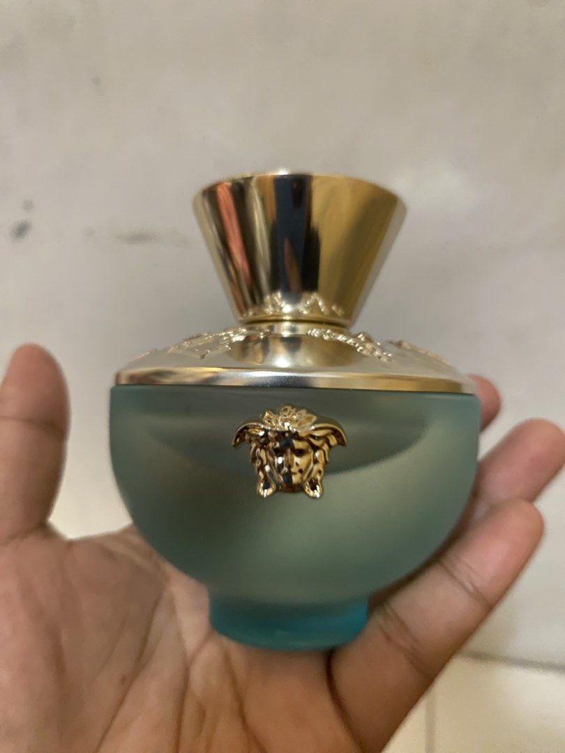 Versace Dylan Turquoise Eau de Toilette (Category: Fragrance & Deodorants) located in Malabon City. Submitted by eunoia080404815 (Listing ID 1460104917, Image 1). Description: - Authentic Versace Dylan Turquoise Eau de Toilette - Stunning turquoise bottle with elegant gold accents - Features the iconic Medusa head logo on the cap - Engraved 'Dylan Turquoise' name on the cap - Ideal fragrance for everyday use - Bottle is full and ready for its new