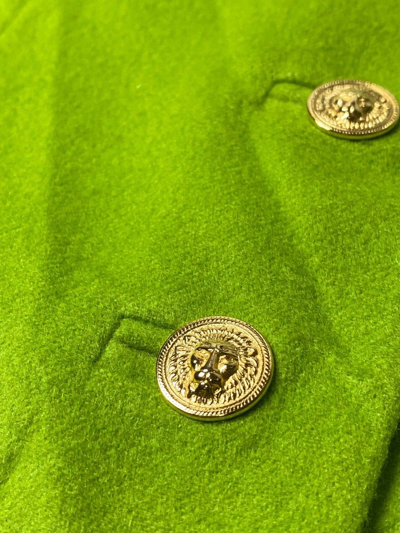 VERSACE VERSUS WOOL WAISTCOAT (Category: Others Tops) located in Balanga. Submitted by dig_gear (Listing ID 1459938235, Image 3). Description: GIANNI VERSACE VERSUS WOOL WAISTCOAT This vintage Versus Gianni Versace waistcoat is crafted from a vibrant lime green wool fabric, structured with princess seams to create a highly tailored, longline silhouette. It features a sophisticated notched collar, a classic lapel, two horizontal welt hip pockets, 