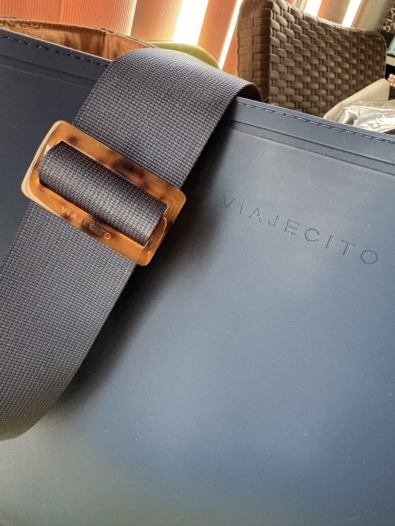 Viajecito MNL Laptop Tote (Category: Laptop Bags & Sleeves) located in Muntinlupa City. Submitted by caseypeech (Listing ID 1459923334, Image 2). Description: - Bag Dimensions: (L) 11.9” x (W) 4.52” x (H) 14.3” - Navy Blue, Nylon Straps (Adjustable for Comfort) w/ Heavy-Duty Acrylic Sliders (Sleek & Durable) - Canvas Inner Lining (Soft & Protective) - 3 Inner Pockets for Better Organization - Sleek • Durable • Work-Ready • Water-Resistant - RFS: 