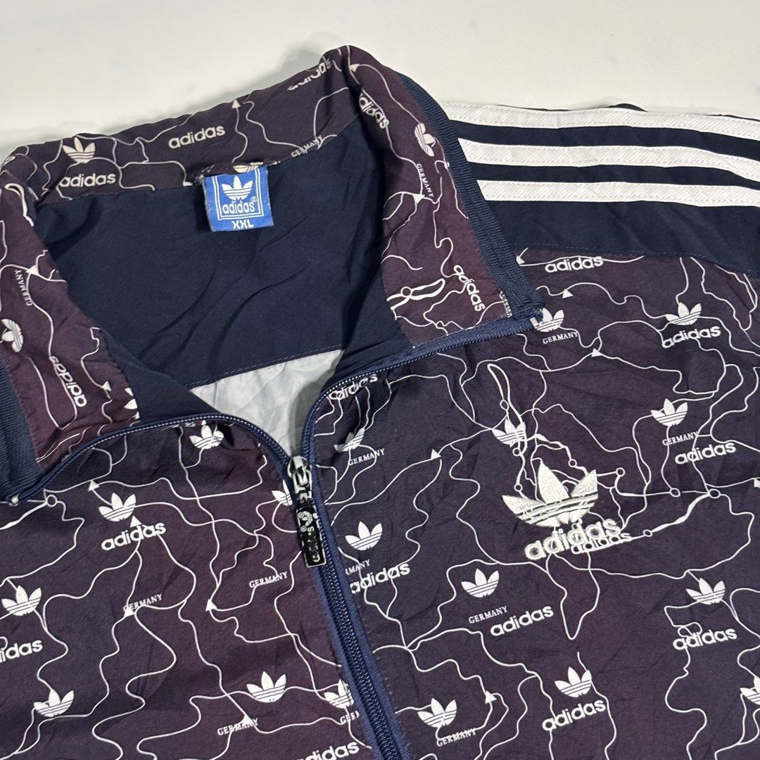 Vintage Adidas Track Jacket Germany Map Print (Category: Coats, Jackets and Outerwear) located in Cavite. Submitted by sidirvinp76902 (Listing ID 1460091991, Image 3). Description: - Unique all-over Germany map print - Classic Adidas three stripes on sleeves - Full zip closure - Ribbed cuffs and hem - Perfect for casual wear or sports.
