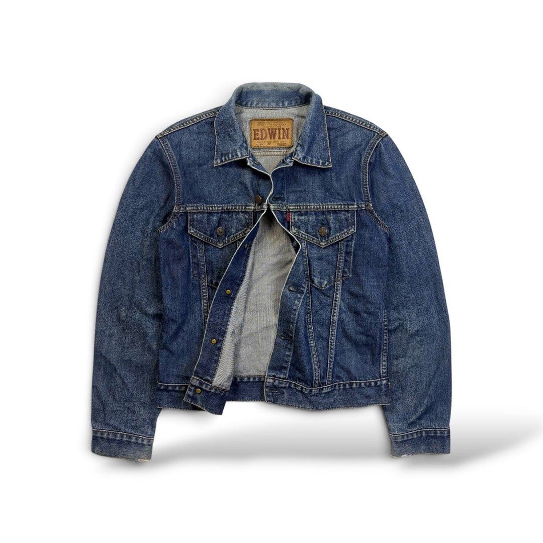 Vintage Edwin Medium-Wash Denim Trucker Jacket (Category: Coats, Jackets and Outerwear) located in Valencia. Submitted by raftawasil (Listing ID 1460046136, Image 2). Description: Made in Japan Measurements: Length: 23.5” Width : 18” Sleeves: 24” Size on tag: Medium Issue: Distressed cuffs making the piece more vintage look Condition: 8.5 / 10 .
