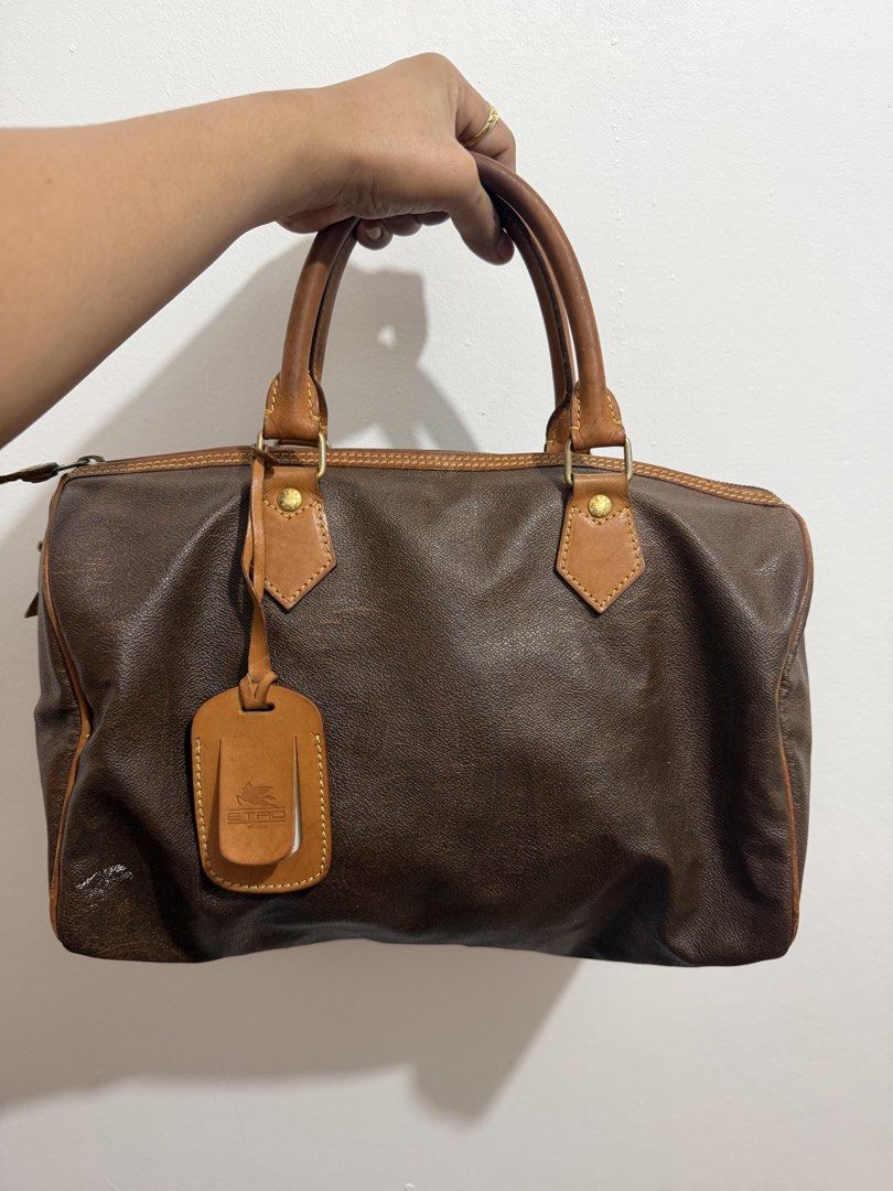 Vintage Etro Boston (Category: Shoulder Bags) located in Caloocan City. Submitted by autorjoymarie24 (Listing ID 1460051303, Image 1). Description: ✨ FOR SALE ✨ 👜 Classy Vintage Leather Bag 🤎 Perfect for everyday use, office, travel, or your next OOTD! ✨ Elegant vintage look ✨ Spacious & stylish ✨ Genuine leather feel ✨ Timeless brown & tan combination.